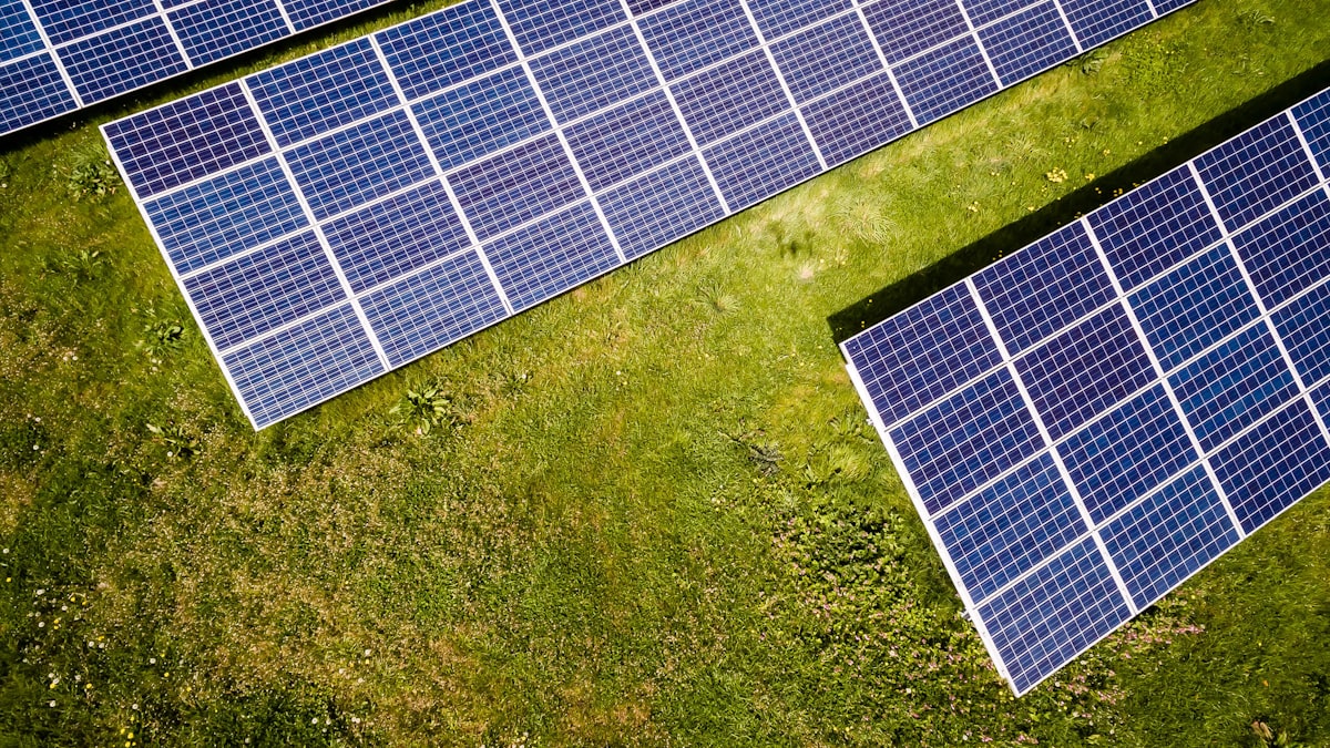 Solar installer working on a rooftop solar system for churches and non-profits